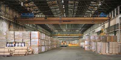 Warehouse interior with cranes and truck